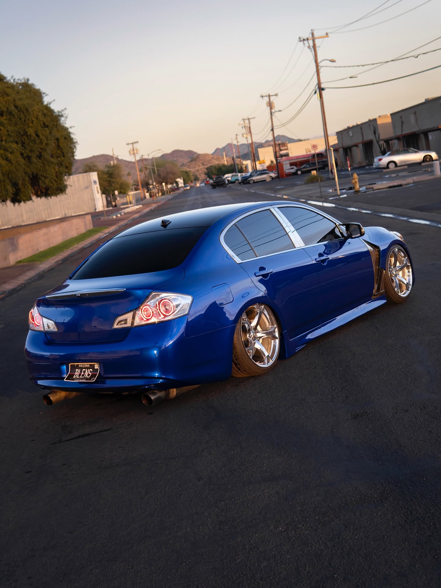 Dark window tint on blue Infiniti G37 — TrackStyle Phoenix